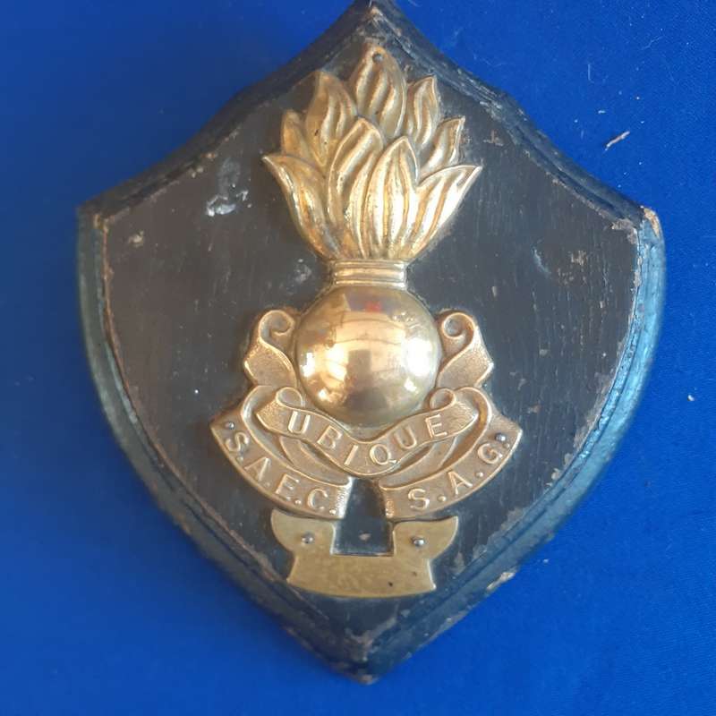 SANDF Army Ubique Badge on a wooden plaque - brass and wood  18cms x 15 cms