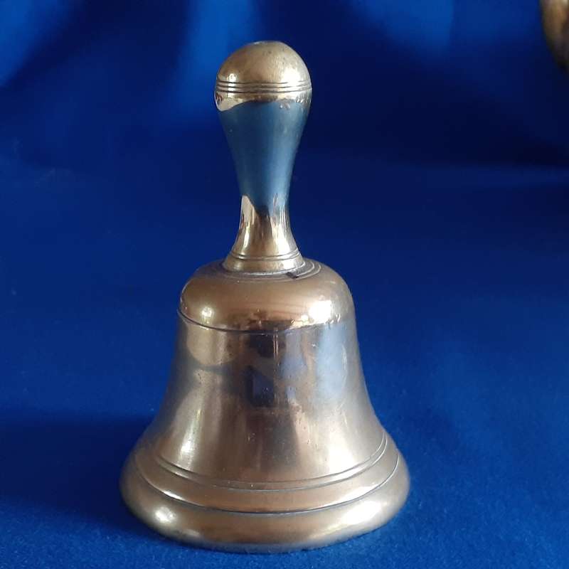 Small sturdy brass table bell.  10 cms tall