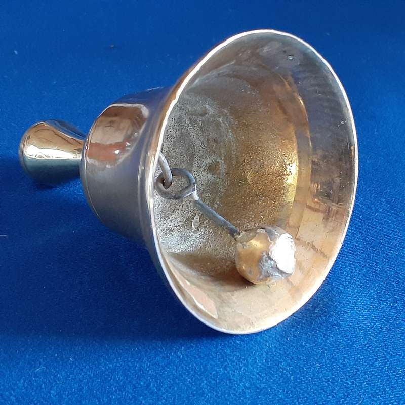 Small sturdy brass table bell.  10 cms tall