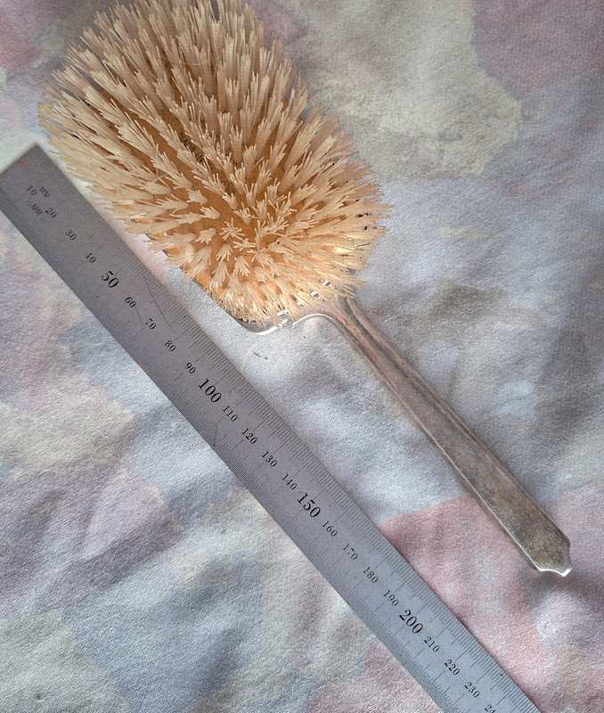 Hallmarked silver Deco hairbrush. Good condition.