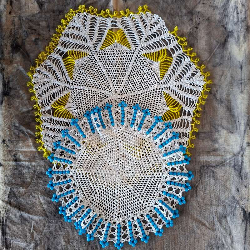 2 Crochet doilies jug covers with glass beads