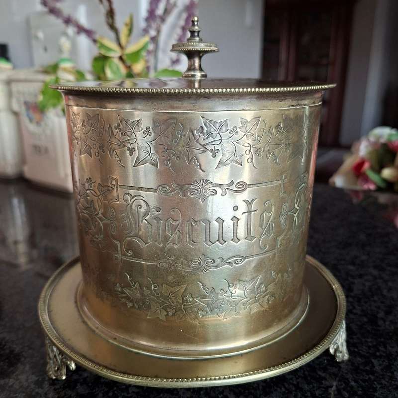 Antique silverplate biscuit barrel on three feet
