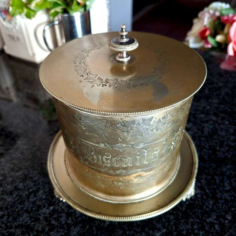 Antique silverplate biscuit barrel on three feet