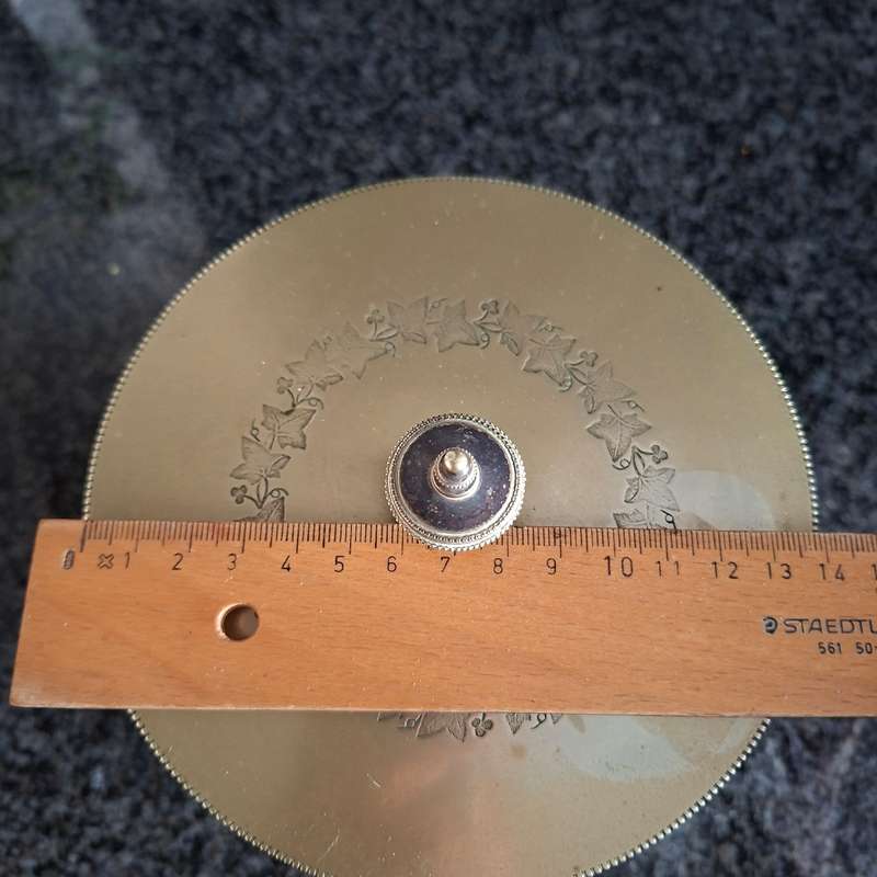 Antique silverplate biscuit barrel on three feet