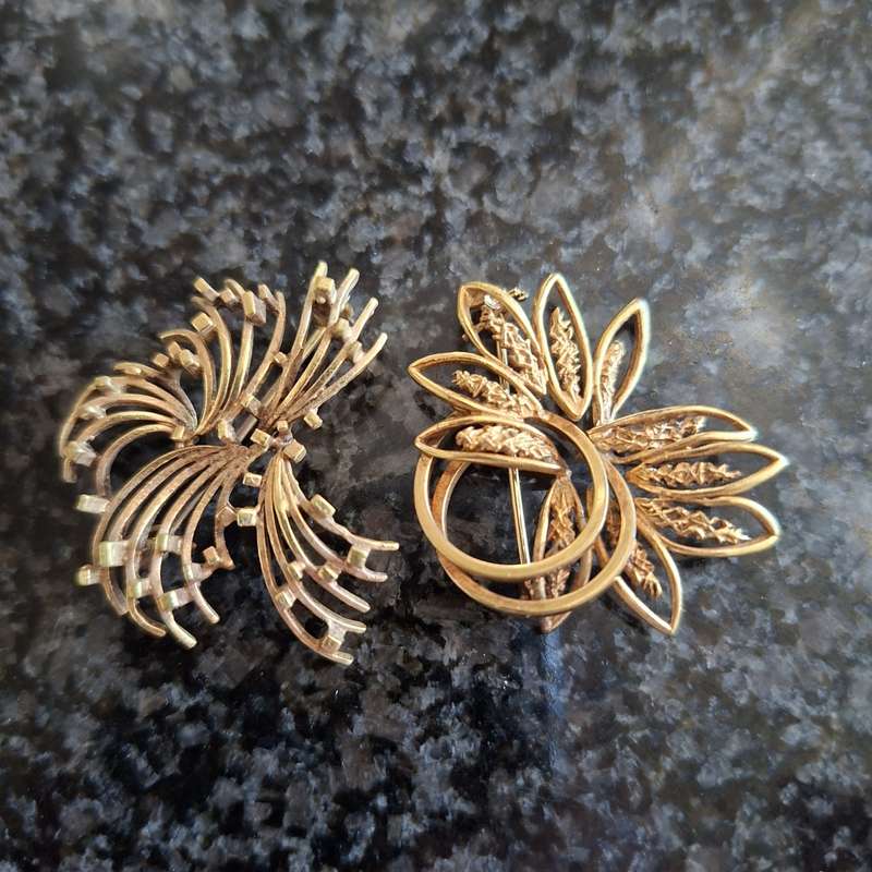 2 gold metal brooches stamped "double" and another indistinct mark.