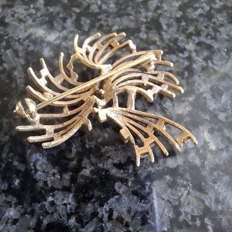 2 gold metal brooches stamped "double" and another indistinct mark.