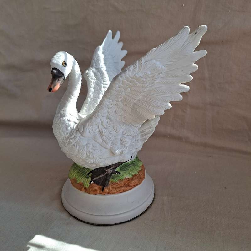 Ceramic white swan in bisque ware.  20cms tall.   Beautifully elegant