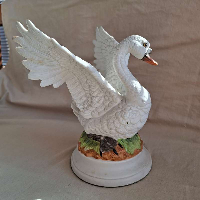 Ceramic white swan in bisque ware.  20cms tall.   Beautifully elegant
