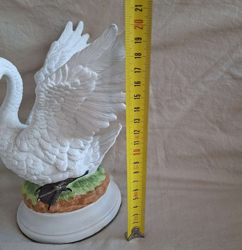 Ceramic white swan in bisque ware.  20cms tall.   Beautifully elegant