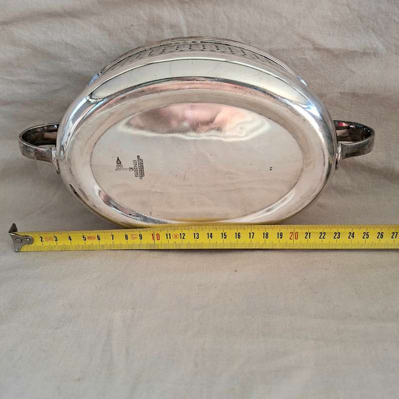 Silver plated fruit dish with two handles.   Walker and Hall.
