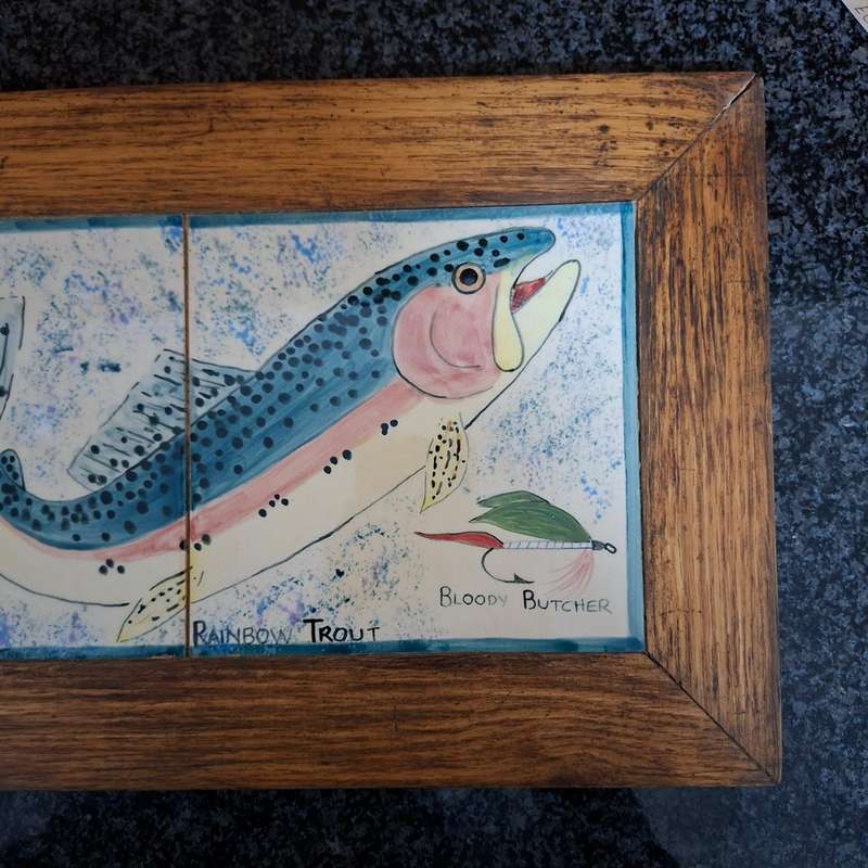 2 painted tile pictures - rainbow trout and flies set in oak frames