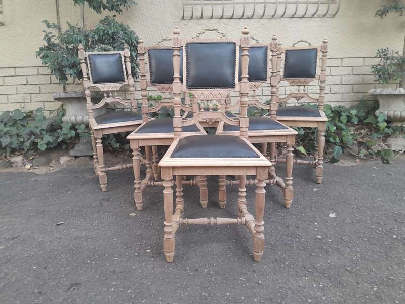 A 20th Century Set of Six of Carved Walnut Dining Chairs Upholstered in Leather and in a Contempo...
