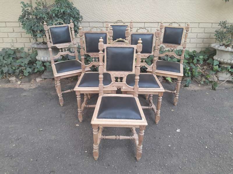 A 20th Century Set of Six of Carved Walnut Dining Chairs Upholstered in Leather and in a Contempo...