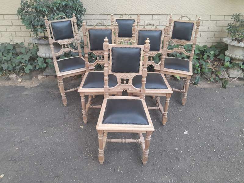 A 20th Century Set of Six of Carved Walnut Dining Chairs Upholstered in Leather and in a Contempo...