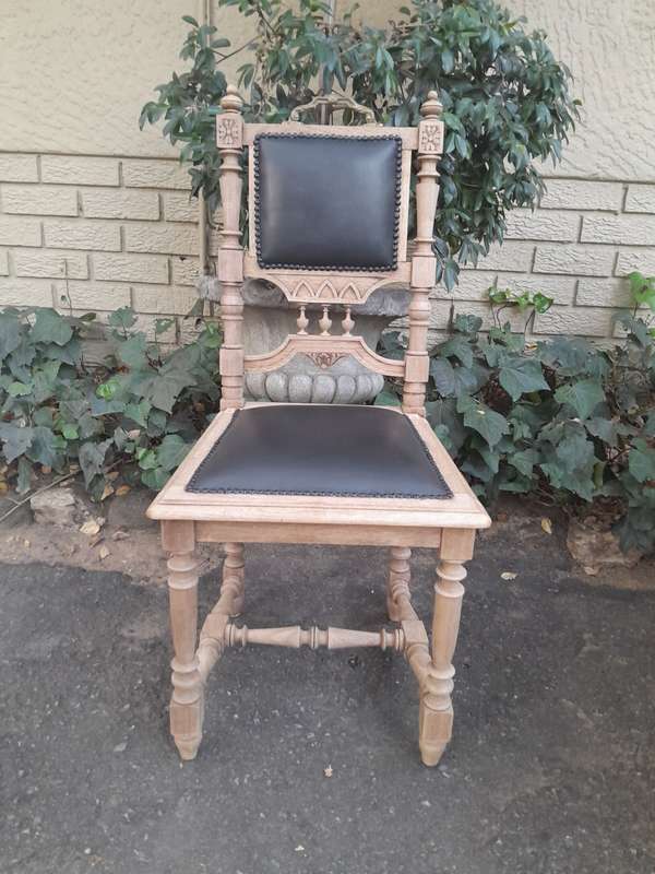 A 20th Century Set of Six of Carved Walnut Dining Chairs Upholstered in Leather and in a Contempo...