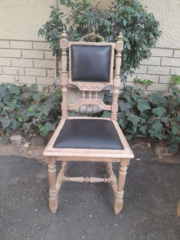 A 20th Century Set of Six of Carved Walnut Dining Chairs Upholstered in Leather and in a Contempo...