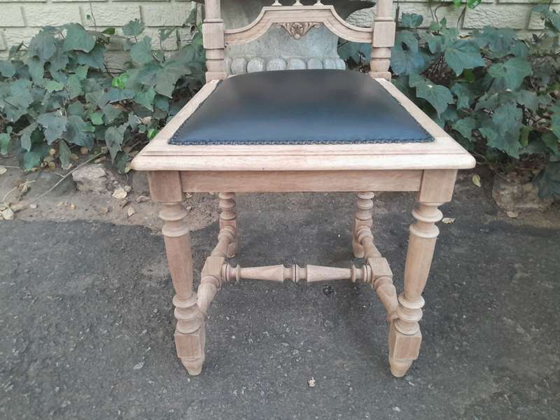 A 20th Century Set of Six of Carved Walnut Dining Chairs Upholstered in Leather and in a Contempo...