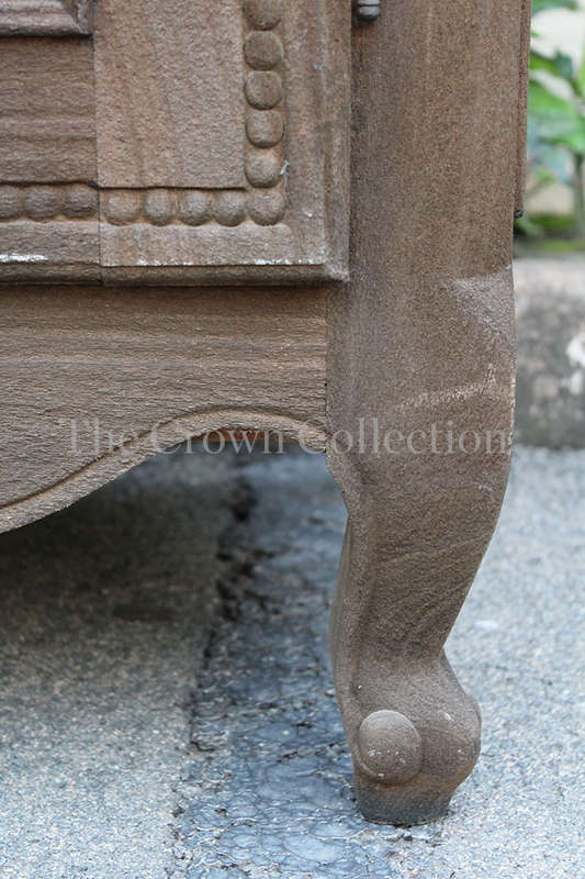 A 20th Century French Style Armoire in a  Carved Wood and in a Natural Wood Finish