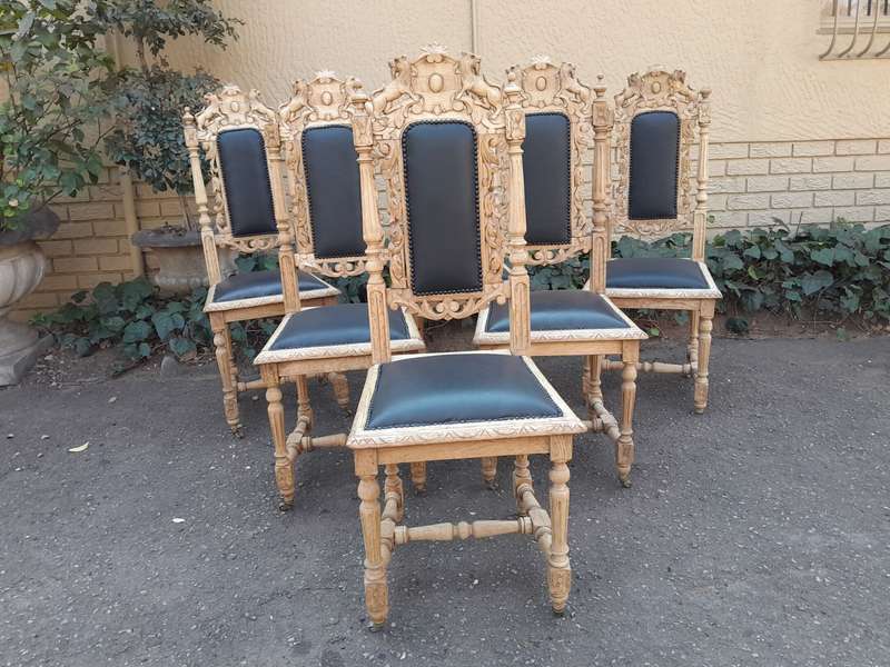 A 19th Century French Set of Six Ornately Carved Oak Chairs in a Contemporary Bleached Finish and...