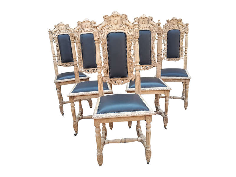 A 19th Century French Set of Six Ornately Carved Oak Chairs in a Contemporary Bleached Finish and...