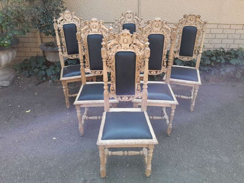 A 19th Century French Set of Six Ornately Carved Oak Chairs in a Contemporary Bleached Finish and...