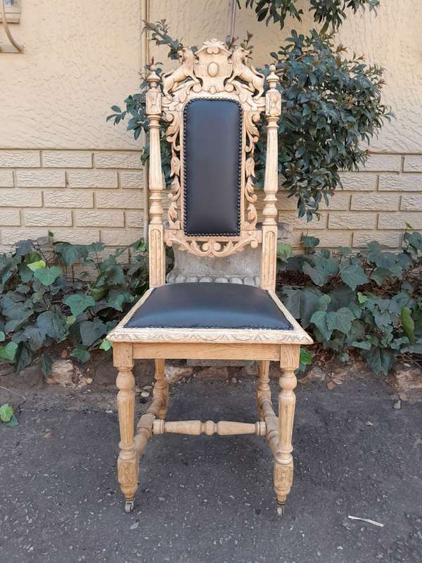 A 19th Century French Set of Six Ornately Carved Oak Chairs in a Contemporary Bleached Finish and...