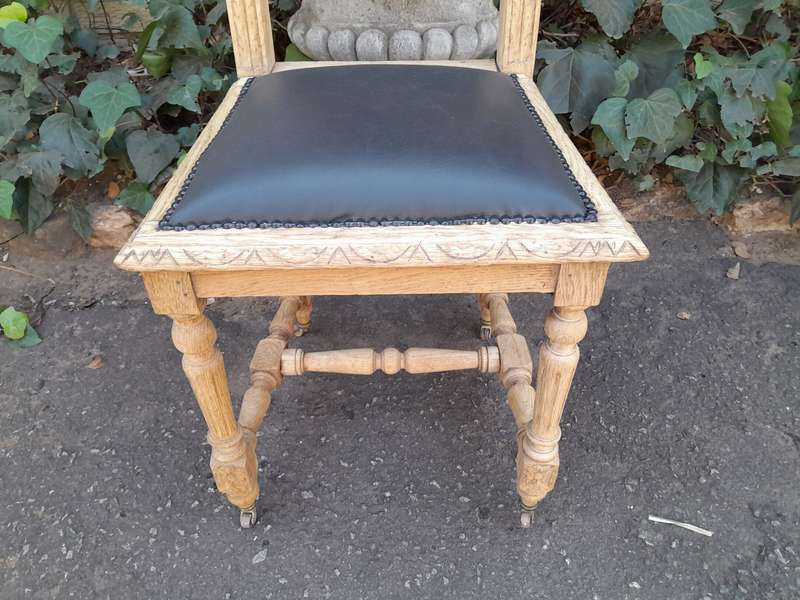A 19th Century French Set of Six Ornately Carved Oak Chairs in a Contemporary Bleached Finish and...