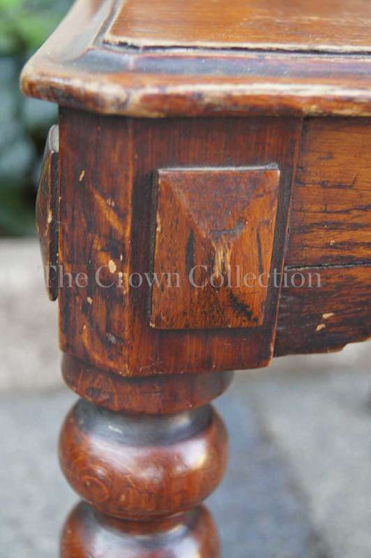 A Late Vicrian Oak Hall chair with with burbon stile on scrolled ear on back rest and a scrolled ...