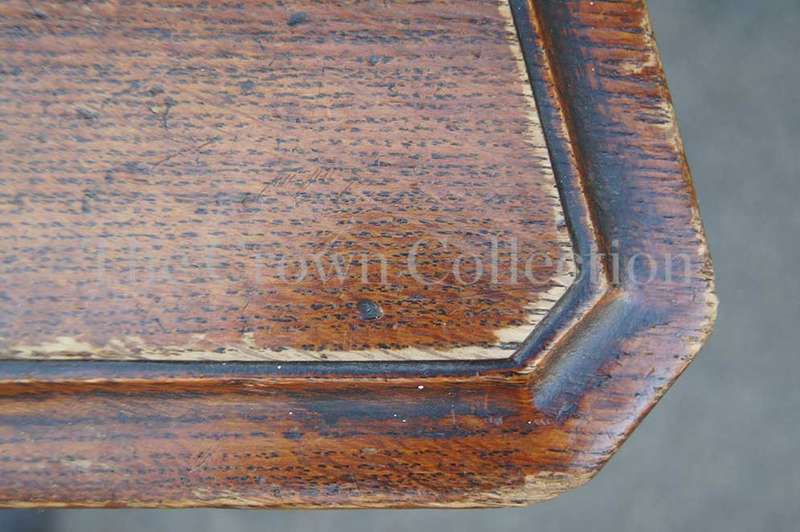 A Late Vicrian Oak Hall chair with with burbon stile on scrolled ear on back rest and a scrolled ...