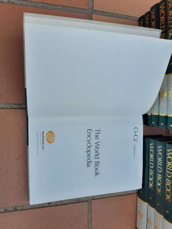 A 20TH Century Set of Twenty Two (22) Volumes of a Complete Set of 1989 World Book Encyclopedia -...