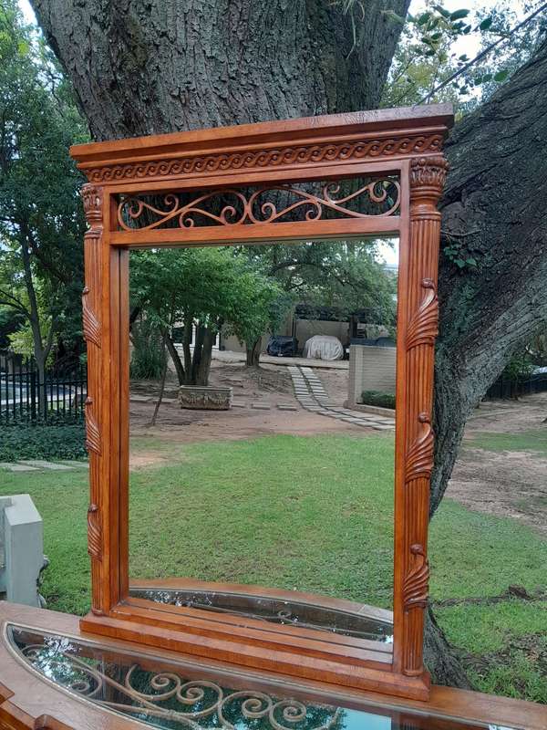 A 20th Century Set of Carved Wooden Console Table with Matching Mirror