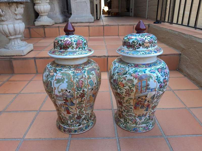 A 20th Century Pair of Chinese Famille Rose Porcelain Covered Urns