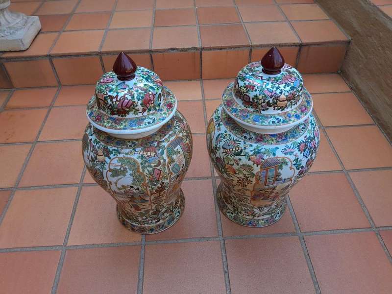 A 20th Century Pair of Chinese Famille Rose Porcelain Covered Urns