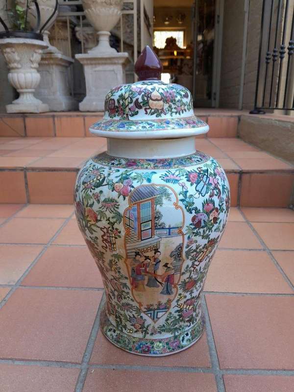 A 20th Century Pair of Chinese Famille Rose Porcelain Covered Urns