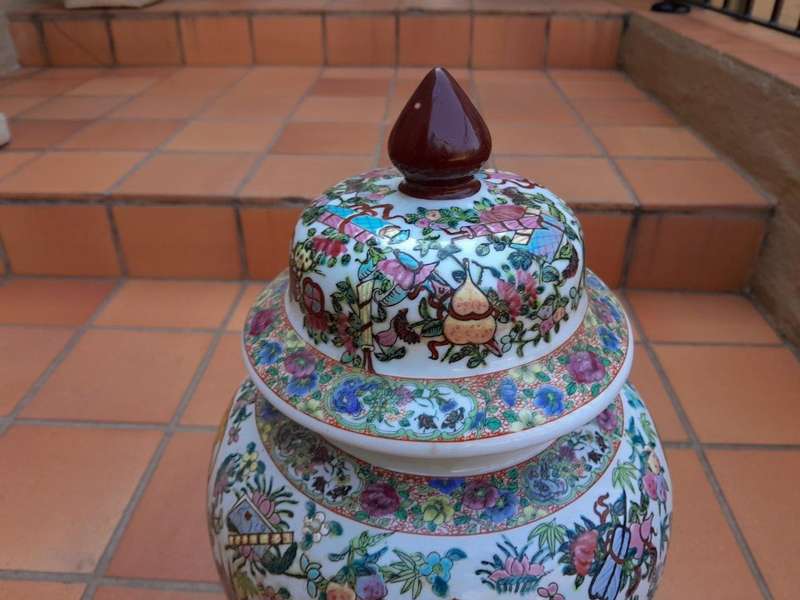 A 20th Century Pair of Chinese Famille Rose Porcelain Covered Urns