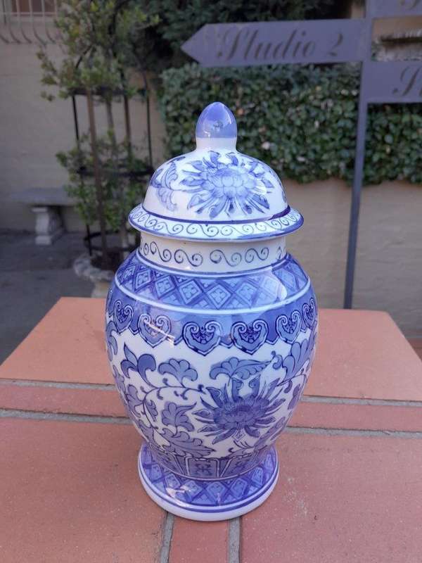 A 20th Century Chinese Blue And White Painted Vase With Lid