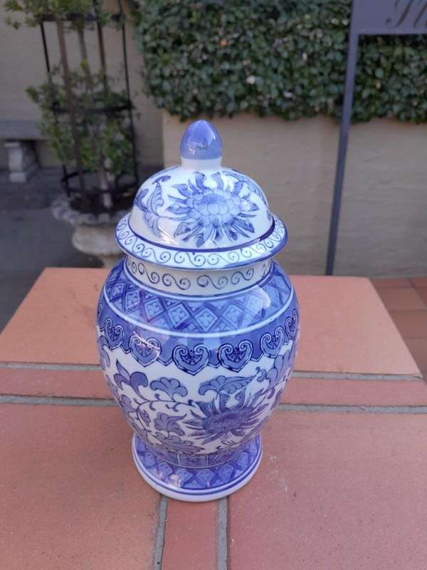 A 20th Century Chinese Blue And White Painted Vase With Lid