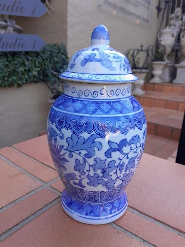 A 20th Century Chinese Blue And White Painted Vase With Lid