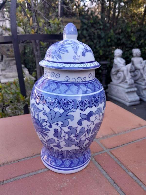 A 20th Century Chinese Blue And White Painted Vase With Lid