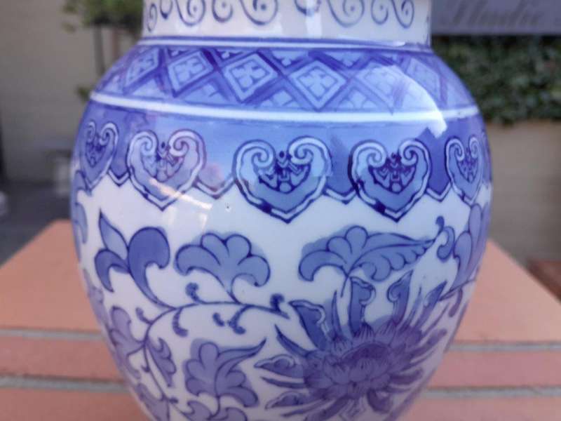 A 20th Century Chinese Blue And White Painted Vase With Lid