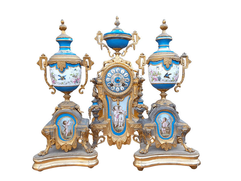 A 19th Century French  Gilt Metal And Porcelain Clock Garniture Set On Original Giltwood Bases A...