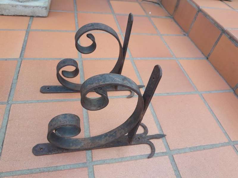 A Pair Of Rustic Wrought Iron Shelf Brackets