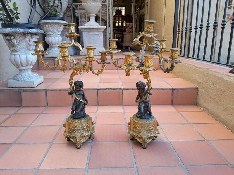 A 19TH Century Large Size Pair of French Louis VI Gilt Bronze Putti Candelabras