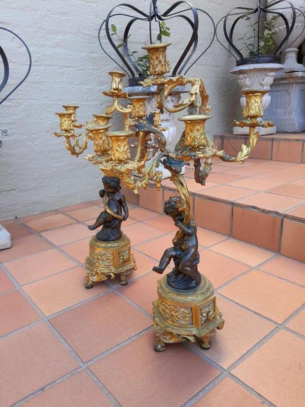 A 19TH Century Large Size Pair of French Louis VI Gilt Bronze Putti Candelabras