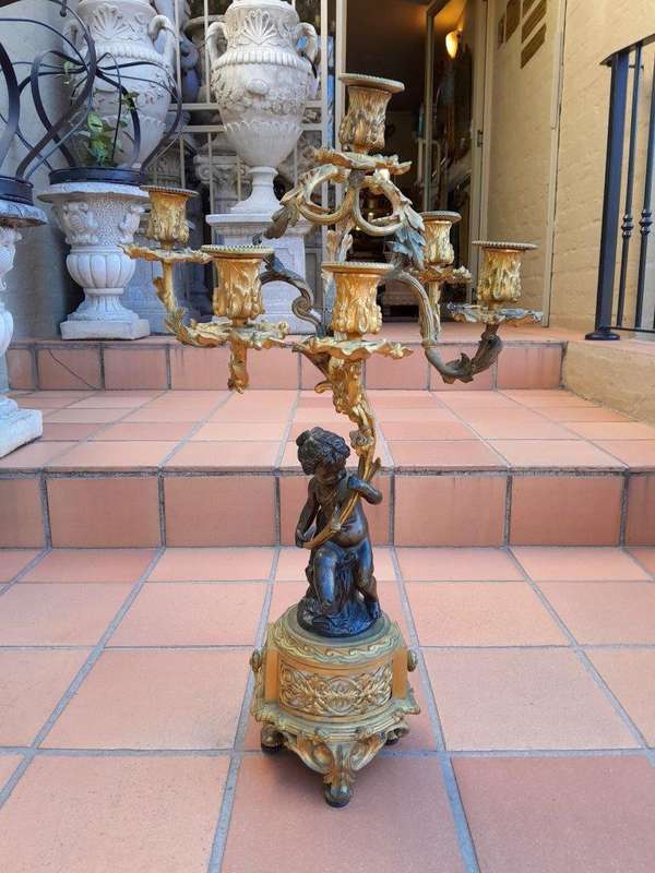 A 19TH Century Large Size Pair of French Louis VI Gilt Bronze Putti Candelabras