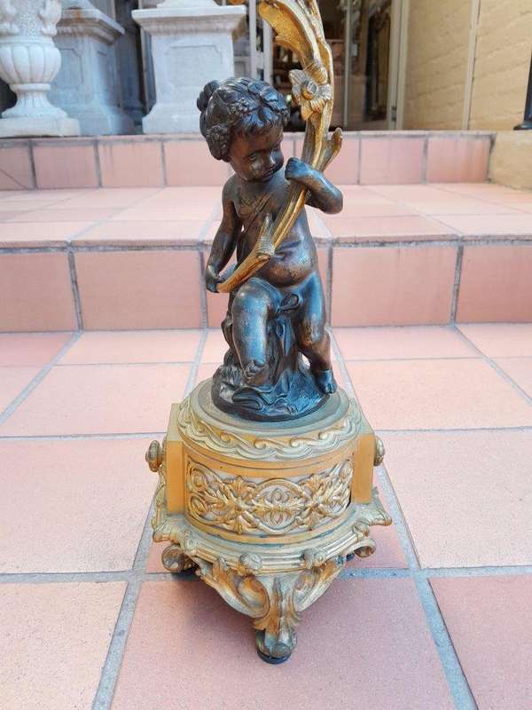 A 19TH Century Large Size Pair of French Louis VI Gilt Bronze Putti Candelabras