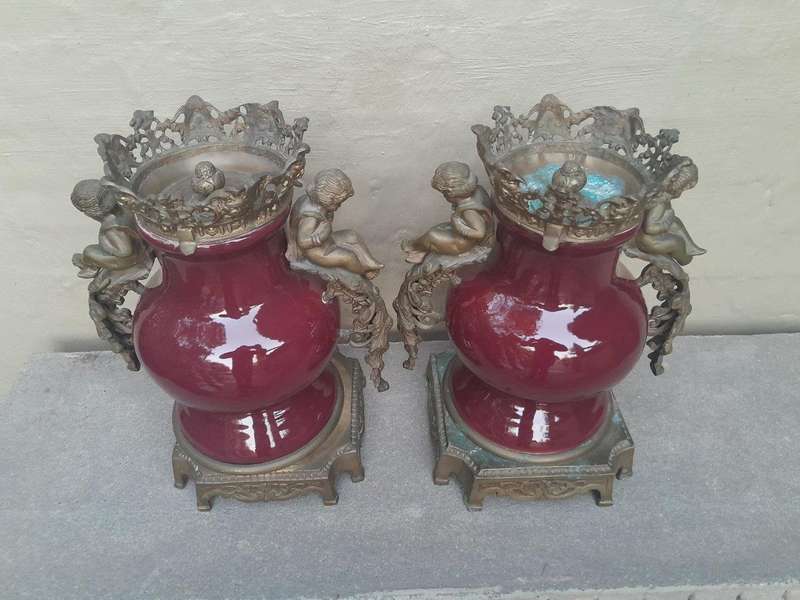 A Pair Of French Decorative Porcelain Cherub & Ormolu Urns
