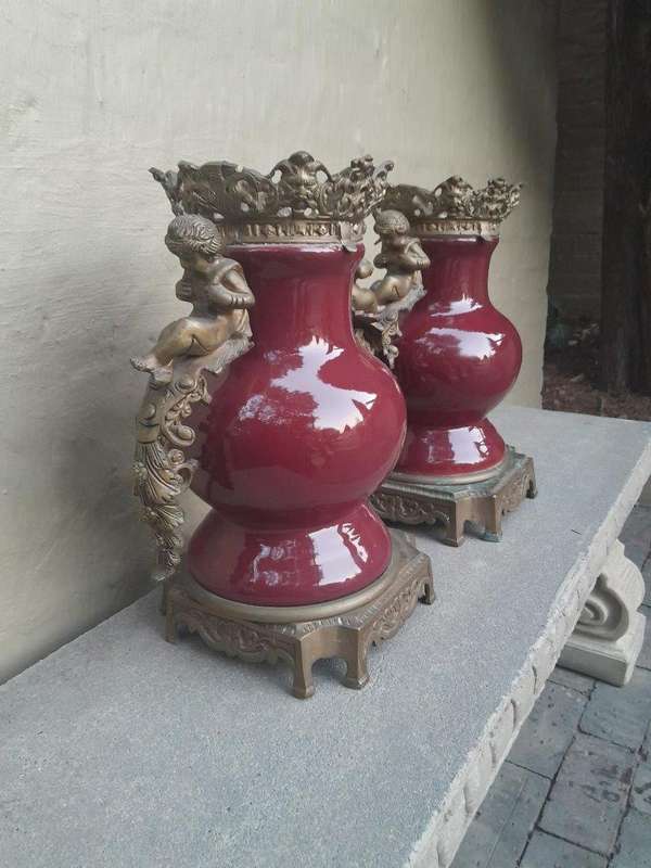 A Pair Of French Decorative Porcelain Cherub & Ormolu Urns