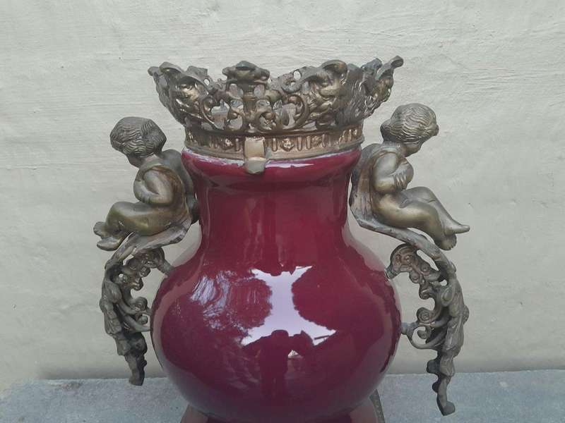 A Pair Of French Decorative Porcelain Cherub & Ormolu Urns