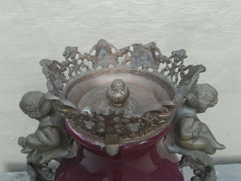 A Pair Of French Decorative Porcelain Cherub & Ormolu Urns